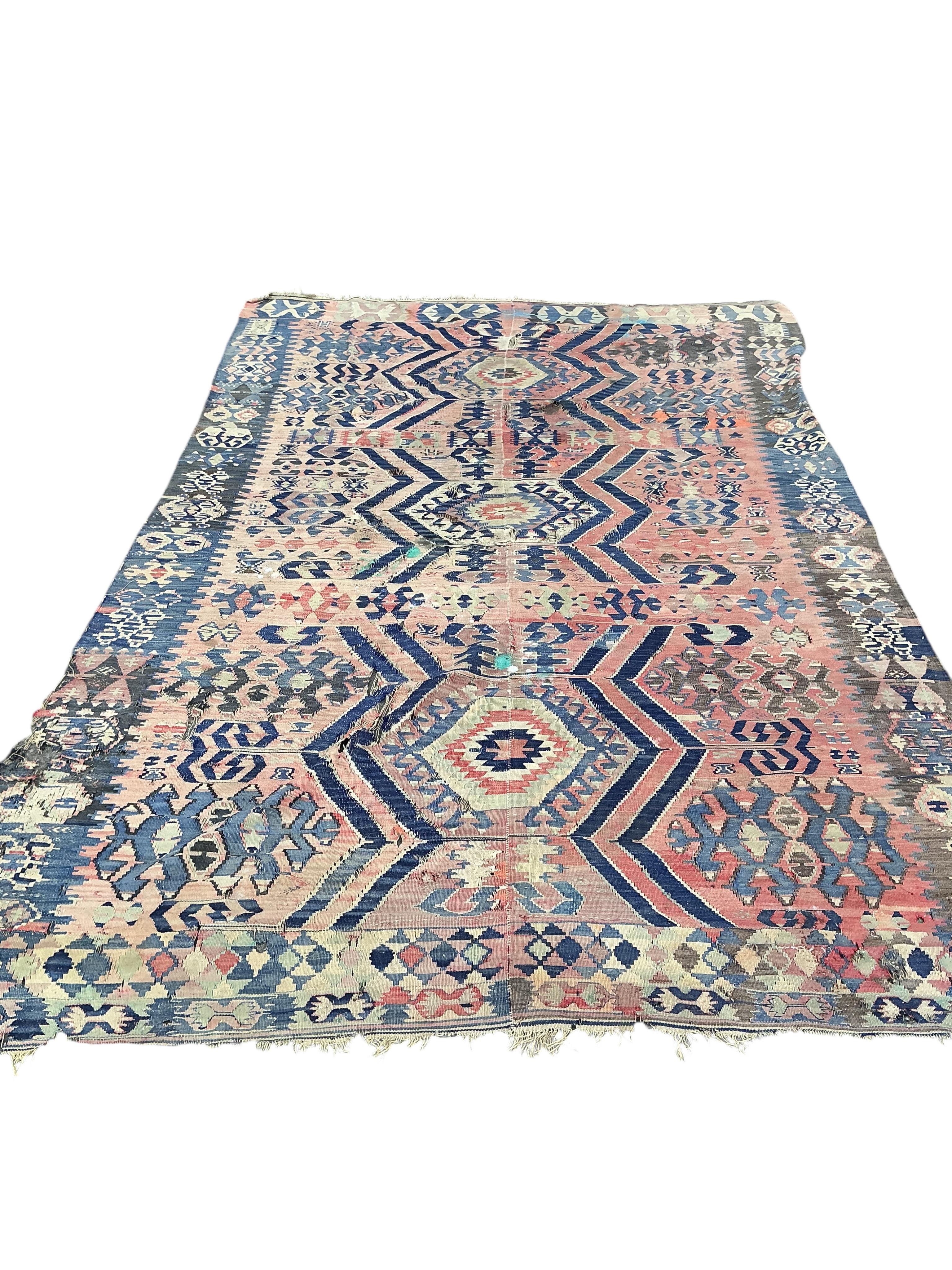 A Kilim polychrome flatweave carpet, 298 x 199cm